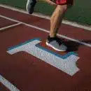 person running on tracking field