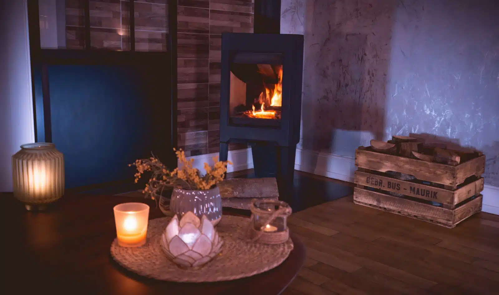 a living room with a wood burning stove